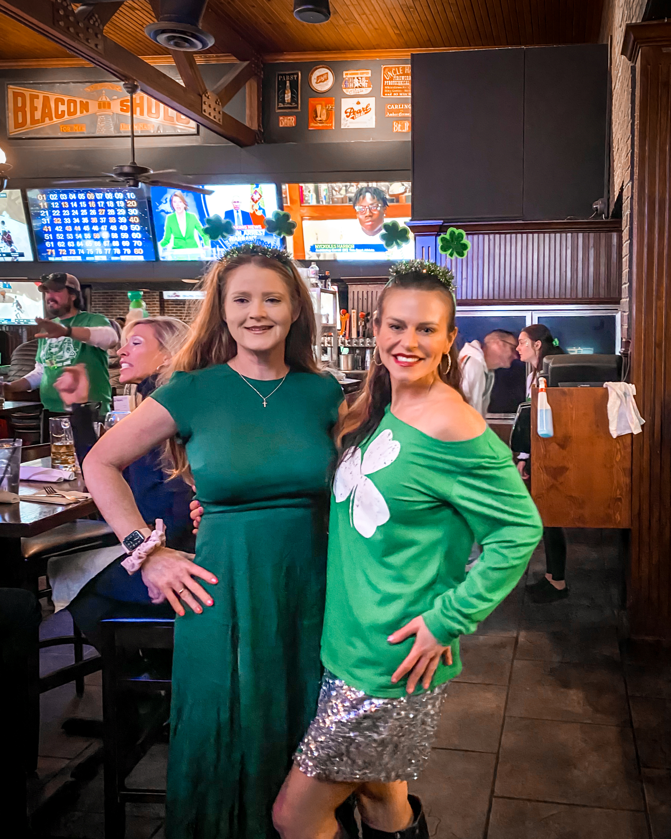 Casey Kolp with a friend celebrating St. Patrick's Day in a bar.