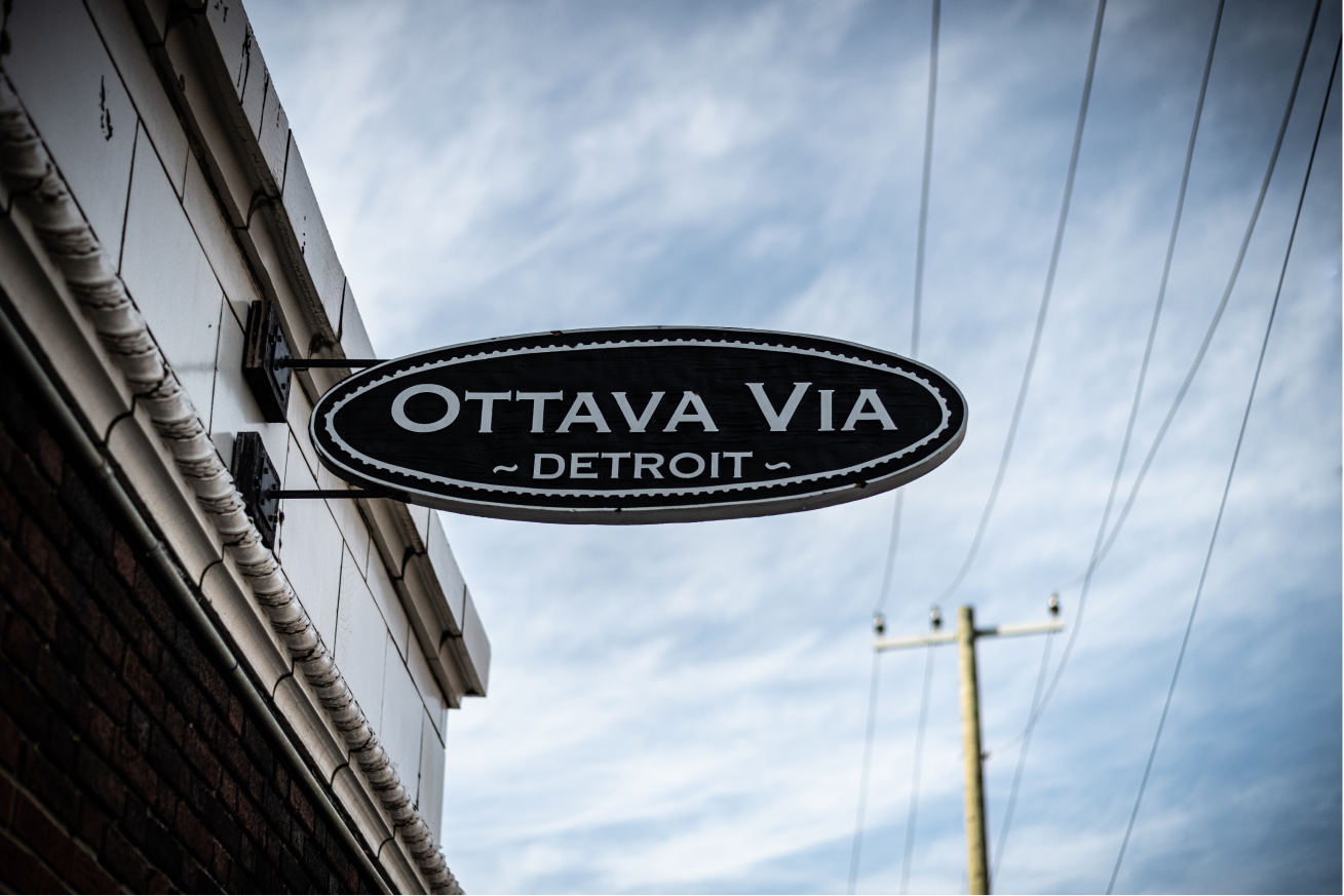Outdoor signage of Ottava Via in Detroit.