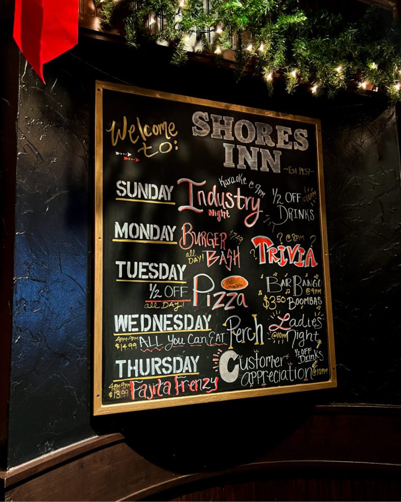 Chalkboard menu and weekly specials of Shores Inn in Michigan.